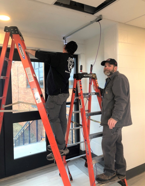 Installation of wiring for a security camera at CTI