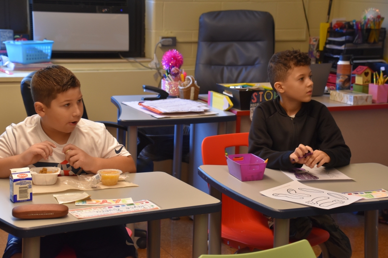 Two Salt Point Center students are focused on the first day of class