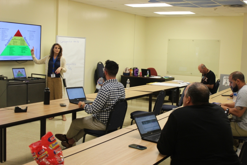 Regional Summer School Co-principal Rebecca Green leads a professional development session on academics and behavior