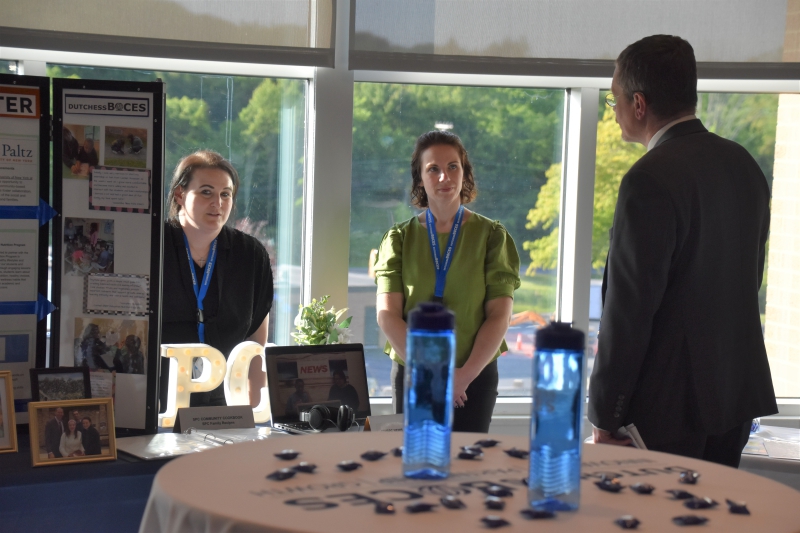 Dutchess County Comptroller Dan Aymar-Blair speaks with Salt Point Center Principal Melissa Murphy and Assistant Principal Nicole Gardiner at the summit.