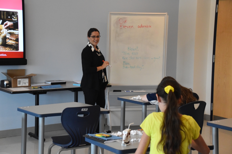 Students work on a poetry lesson during class.