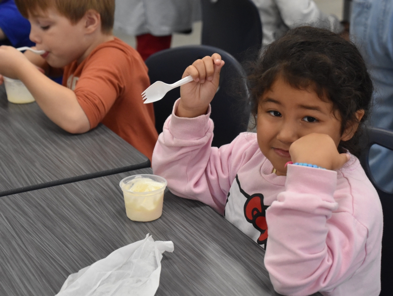 Victoria enjoys some ice cream during Community Connections Friday at Dutchess BOCES.