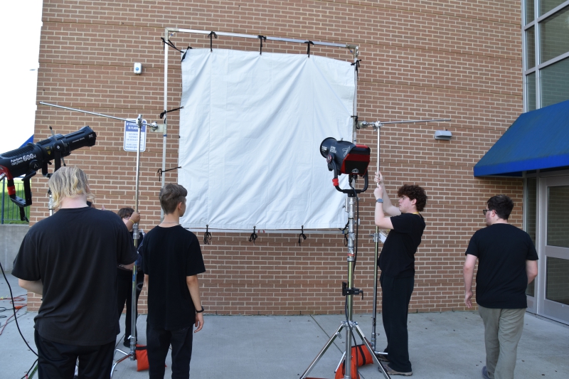 CTI Digital Media Production students assist with the filming of the commercial outside Resilience Academy.