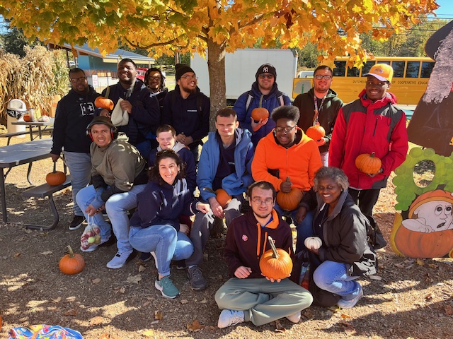 Students pose for a photo during the trip to Meadowbrook Farm.