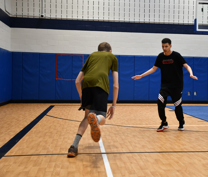 Resilience Academy students participate in a basketball tournament right before spring recess.