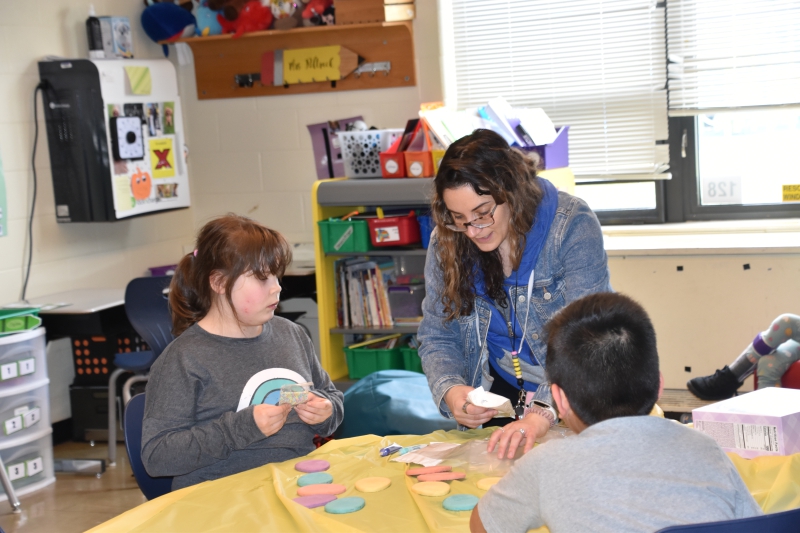 Students decorate cookies at Salt Point Center before break.