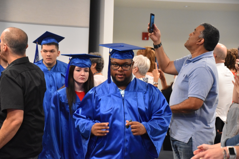 Students enter the ceremony as part of the processional.