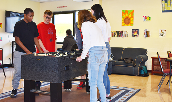 [PIC] Alternative High School Students Play Foosball In The New Recreation Room