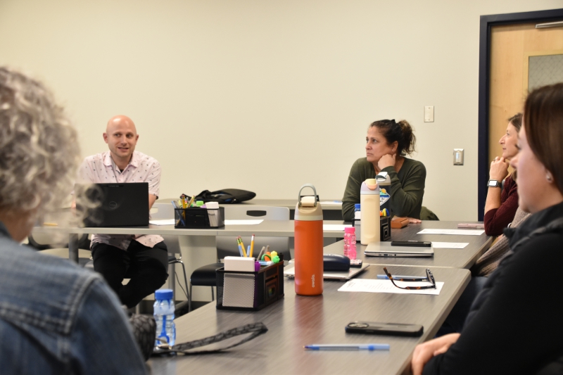 School Social Worker Rob LaColla leads a monthly roundtable for social workers.