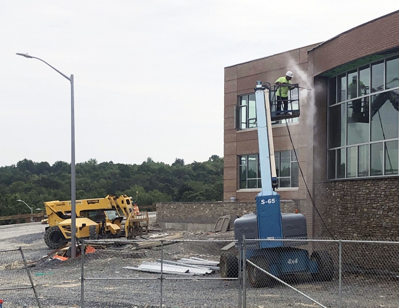 Power washing the building