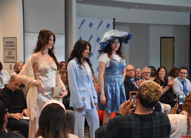 Alondra Vasquez Garcia joins her models on the runway to show off her designs including a cream-colored dress, a light blue suit embellished with a seashell and a blue dress over a white top with a matching puffy hat.
