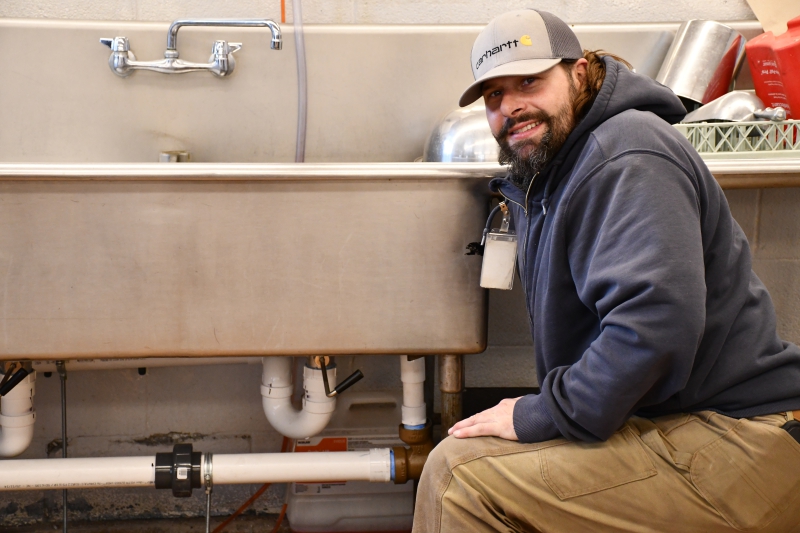 Mike Malone of Dutchess BOCES’ Facilities and Operations checks on the new grease interceptor that was installed in one of the culinary kitchens at the Career and Technical Institute during the holiday break.