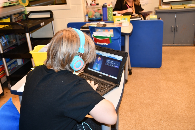 Lyle Beebe picks out clothing for the character he is coding.