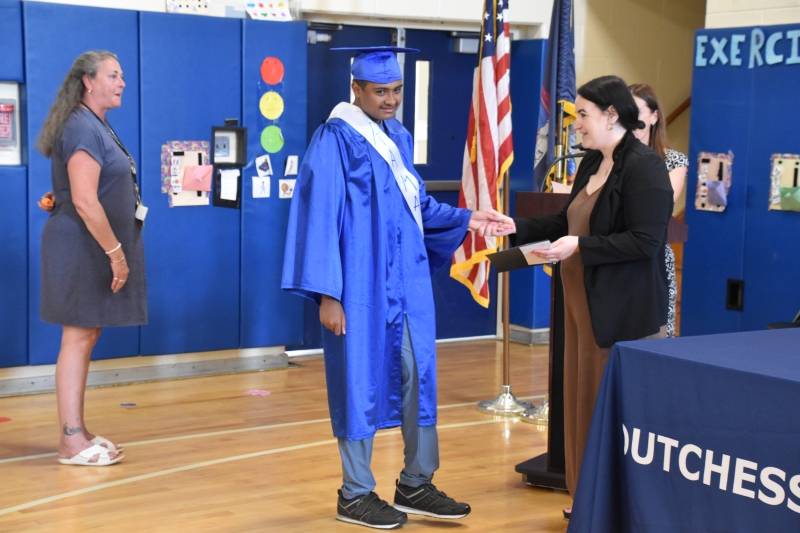 Rama Haridevara accepts the Dutchess BOCES Faculty Association Award  for Citizenship at the ceremony.