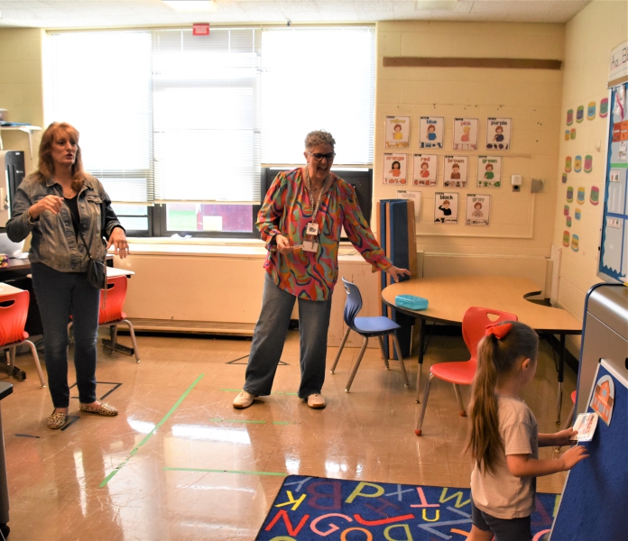 A student demonstrates what she is learning in her classroom during SPC's Open House