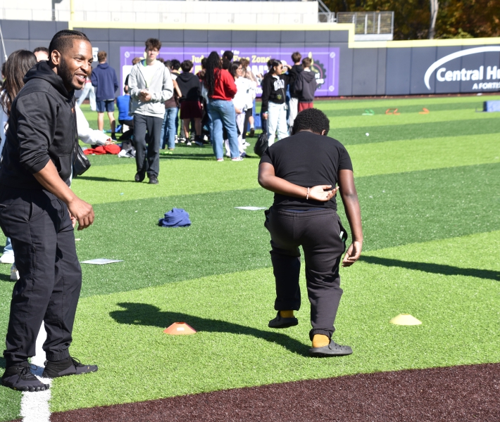 SPC student Aon finishes the challenge course at the Dutchess Youth Health Rally at Heritage Financial Park.